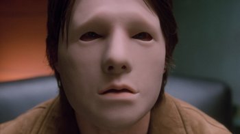 Movie still from “Vanilla Sky” (2001), directed by Cameron Crowe – The face of a person wearing a mask; Close Up shot, High angle