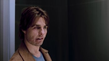 Movie still from “Vanilla Sky” (2001), directed by Cameron Crowe – A person wearing a brown jacket; Close Up shot, Over the shoulder angle