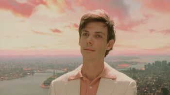 Movie still from “Vanilla Sky” (2001), directed by Cameron Crowe – A man in a white jacket is looking at the camera; Close Up shot, Low angle