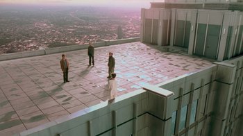 Movie still from “Vanilla Sky” (2001), directed by Cameron Crowe – A group of people standing on top of a building; Extreme Wide shot, High angle