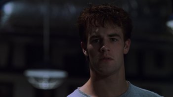 Movie still from “Varsity Blues” (1999), directed by Brian Robbins – A young man is looking into the camera; Close Up shot, Low angle