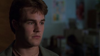 Movie still from “Varsity Blues” (1999), directed by Brian Robbins – A young man is looking into the distance; Close Up shot, Low angle