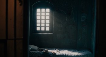 Movie still from “Venom: Let There Be Carnage” (2021), directed by Andy Serkis – A bed room with a bed and a window; Wide shot, Overhead angle