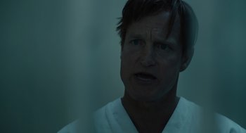 Movie still from “Venom: Let There Be Carnage” (2021), directed by Andy Serkis – A person wearing a white shirt; Close Up shot, Over the shoulder angle