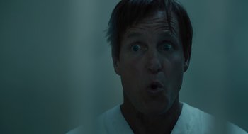 Movie still from “Venom: Let There Be Carnage” (2021), directed by Andy Serkis – A person making a funny face; Close Up shot, Low angle