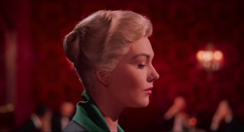 Movie still from “Vertigo” (1958), directed by Alfred Hitchcock – A woman with blonde hair is looking to the side; Close Up shot, Low angle