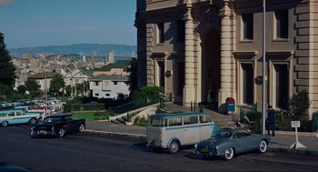 Movie still from “Vertigo” (1958), directed by Alfred Hitchcock – An old van parked on the side of the street; Extreme Wide shot, High angle