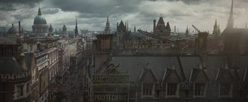 Movie still from “Victor Frankenstein” (2015), directed by Paul McGuigan – An aerial view of a city with a lot of buildings; Extreme Wide shot, High angle