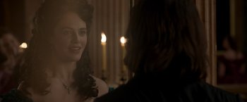 Movie still from “Victor Frankenstein” (2015), directed by Paul McGuigan – A woman is looking at herself in the mirror; Close Up shot, Over the shoulder angle