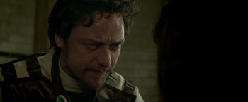 Movie still from “Victor Frankenstein” (2015), directed by Paul McGuigan – A person with a beard; Close Up shot, Over the shoulder angle