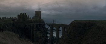 Movie still from “Victor Frankenstein” (2015), directed by Paul McGuigan – A view of a bridge that is over the water; Extreme Wide shot, High angle