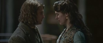 Movie still from “Victor Frankenstein” (2015), directed by Paul McGuigan – A man and a woman face to face in a room; Close Up shot, Over the shoulder angle