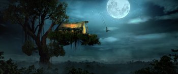 Movie still from “Vikrant Rona” (2022), directed by Anup Bhandari – A person on a swing in the middle of the night; Extreme Wide shot, Low angle
