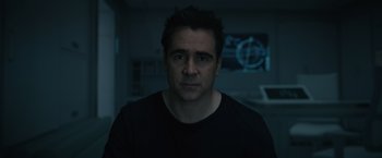 Movie still from “Voyagers” (2021), directed by Neil Burger – A person wearing a black t - shirt; Close Up shot, Low angle