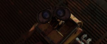 Movie still from “WALL·E” (2008), directed by Andrew Stanton – An image of an object that looks like an old camera; Extreme Close Up shot, Low angle