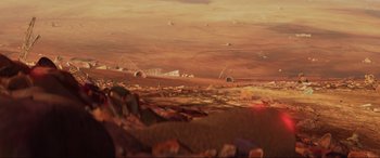 Movie still from “WALL·E” (2008), directed by Andrew Stanton – An image of an image of a desert like area; Extreme Wide shot, High angle
