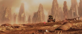 Movie still from “WALL·E” (2008), directed by Andrew Stanton – An image of a tank in the middle of the desert; Extreme Wide shot, High angle