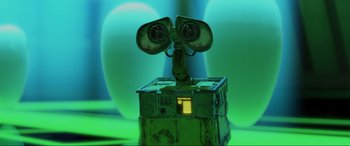 Movie still from “WALL·E” (2008), directed by Andrew Stanton – An old looking robot with two cameras on top of it; Close Up shot, Low angle