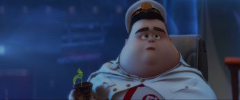 Movie still from “WALL·E” (2008), directed by Andrew Stanton – A character holding a plant; Close Up shot, Low angle