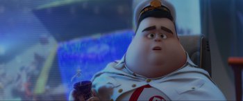 Movie still from “WALL·E” (2008), directed by Andrew Stanton – A character holding a cup of coffee; Medium shot, Low angle