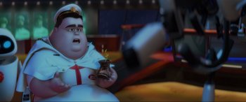 Movie still from “WALL·E” (2008), directed by Andrew Stanton – A cartoon character holding a plant; Wide shot, Low angle