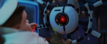 Movie still from “WALL·E” (2008), directed by Andrew Stanton – A white and red robot; Extreme Close Up shot, Over the shoulder angle