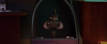 Movie still from “WALL·E” (2008), directed by Andrew Stanton – An image of a cartoon character looking through a window; Close Up shot, Low angle