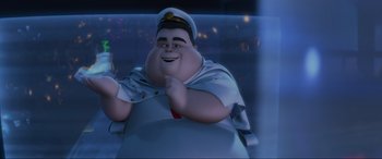 Movie still from “WALL·E” (2008), directed by Andrew Stanton – A fat man wearing a sailor's hat is smiling for the camera; Medium shot, Low angle