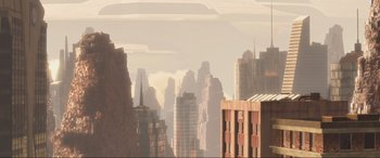 Movie still from “WALL·E” (2008), directed by Andrew Stanton – An artistic view of a city skyline in the daytime; Extreme Wide shot, High angle