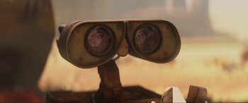 Movie still from “WALL·E” (2008), directed by Andrew Stanton – A pair of binoculars; Extreme Close Up shot, Over the shoulder angle