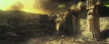 Movie still from “Warcraft” (2016), directed by Duncan Jones – An image of an image of a mountain with a lot of rocks; Extreme Wide shot, High angle