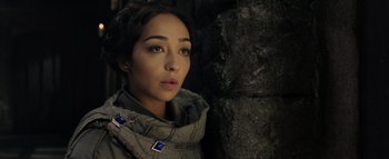 Movie still from “Warcraft” (2016), directed by Duncan Jones – A person wearing a jacket; Close Up shot, Over the shoulder angle