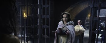 Movie still from “Warcraft” (2016), directed by Duncan Jones – A woman holding a tray with a teapot on it; Medium shot, High angle