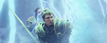 Movie still from “Warcraft” (2016), directed by Duncan Jones – A painting of a man in armor with a sword in his hand; Medium shot, Low angle