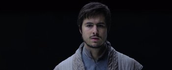 Movie still from “Warcraft” (2016), directed by Duncan Jones – A person wearing a jacket; Close Up shot, Low angle