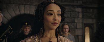 Movie still from “Warcraft” (2016), directed by Duncan Jones – A person wearing a necklace; Close Up shot, Over the shoulder angle