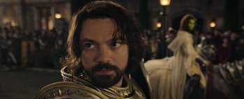 Movie still from “Warcraft” (2016), directed by Duncan Jones – A person with a beard; Close Up shot, Over the shoulder angle