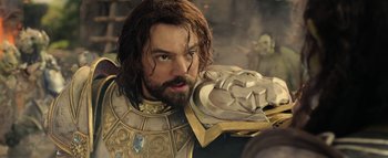 Movie still from “Warcraft” (2016), directed by Duncan Jones – A person wearing a costume; Close Up shot, Low angle