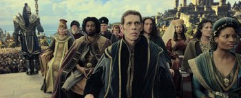 Movie still from “Warcraft” (2016), directed by Duncan Jones – A group of people standing in front of each other; Medium shot, Low angle