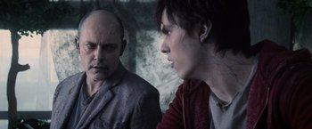 Movie still from “Warm Bodies” (2013), directed by Jonathan Levine – Two men are talking to each other in a forest; Close Up shot, Over the shoulder angle