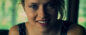 Movie still from “Warm Bodies” (2013), directed by Jonathan Levine – A woman's face with blue eyes; Close Up shot, Overhead angle
