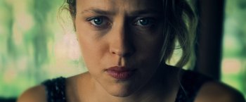 Movie still from “Warm Bodies” (2013), directed by Jonathan Levine – A woman's face with blue eyes; Close Up shot, Low angle