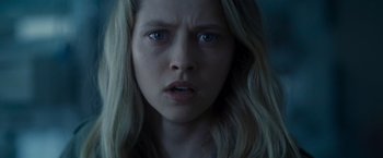 Movie still from “Warm Bodies” (2013), directed by Jonathan Levine – A person with long hair and blue eyes; Close Up shot, Low angle