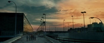 Movie still from “Warm Bodies” (2013), directed by Jonathan Levine – People are walking down the street at sunset; Extreme Wide shot, Low angle