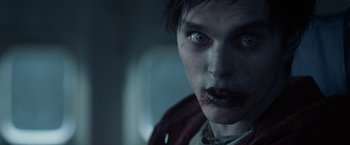 Movie still from “Warm Bodies” (2013), directed by Jonathan Levine – A person with blood on his face; Close Up shot, Over the shoulder angle