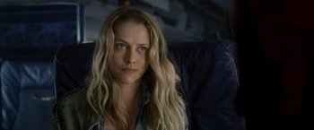 Movie still from “Warm Bodies” (2013), directed by Jonathan Levine – A woman with long blonde hair sitting in a chair; Close Up shot, Over the shoulder angle