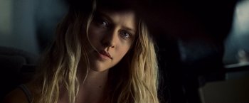 Movie still from “Warm Bodies” (2013), directed by Jonathan Levine – A woman with long blonde hair wearing a black hat; Close Up shot, Over the shoulder angle