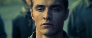 Movie still from “Warm Bodies” (2013), directed by Jonathan Levine – A man's face in a military uniform; Extreme Close Up shot, High angle