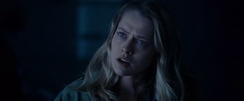 Movie still from “Warm Bodies” (2013), directed by Jonathan Levine – A woman with long blonde hair stares into the camera; Close Up shot, Over the shoulder angle