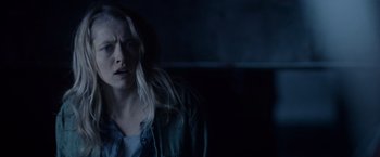 Movie still from “Warm Bodies” (2013), directed by Jonathan Levine – A woman with long blonde hair is looking at the camera; Close Up shot, Over the shoulder angle